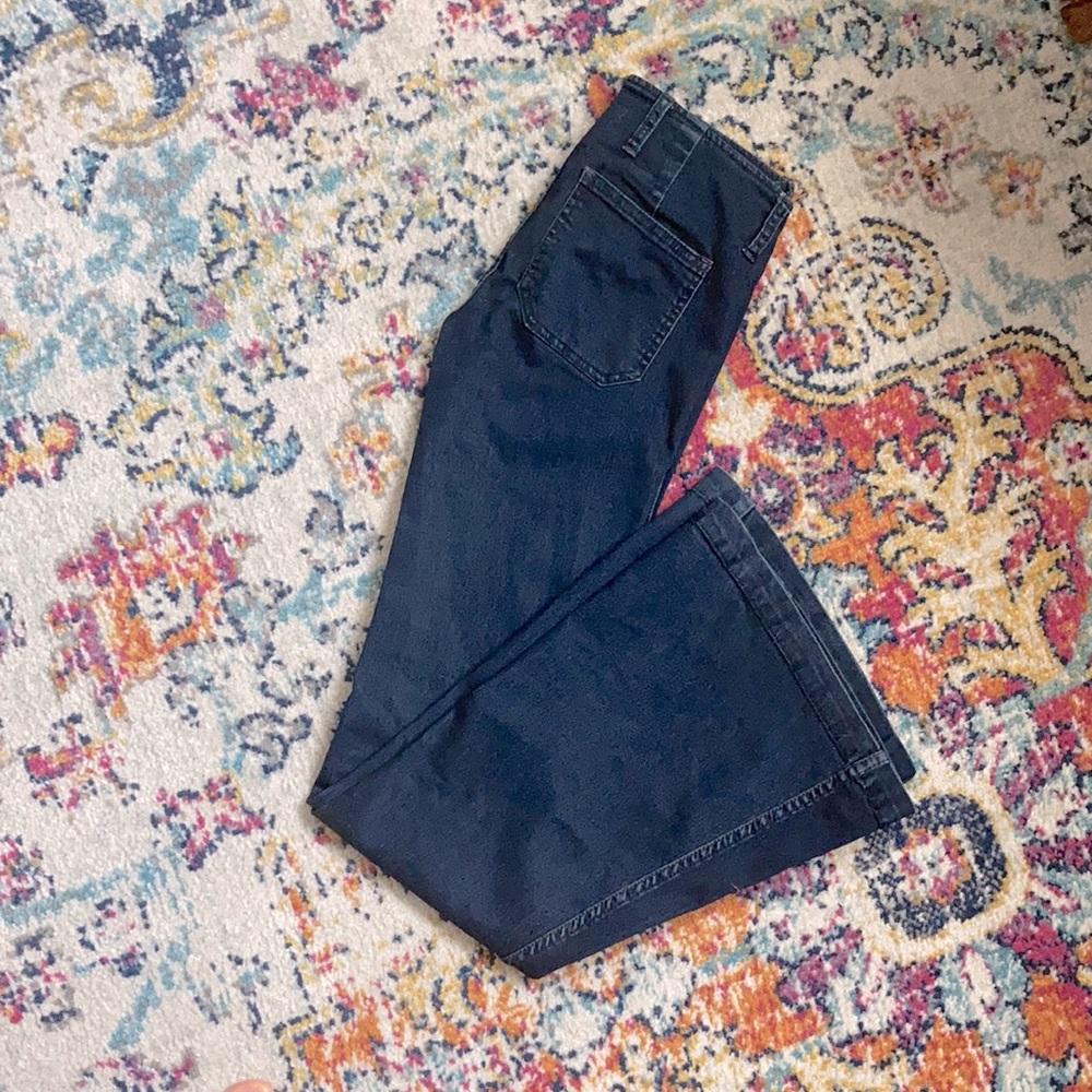 Free People size 25 mid-high waist jeans in a dark blue wash
